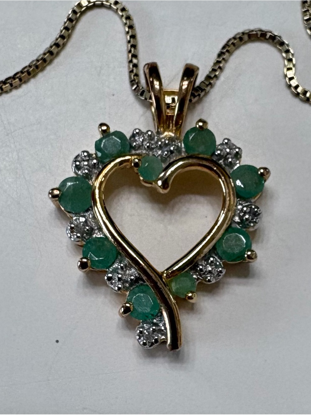 Gold Heart Pendant Necklace with Green Emerald Accent Stones